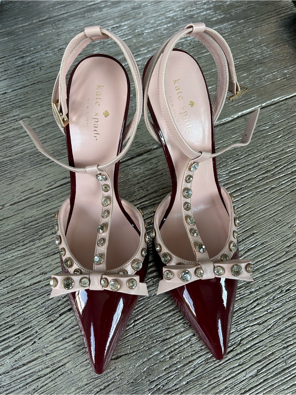 Kate Spade burgundy patent leather with light pink details with rhinestones